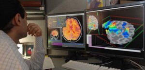 Researcher checking fMRI images. © NIMH | US Department of Health and Human Services