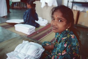 A forced child laborer in the textiles industry © International Labour Organization | Flickr