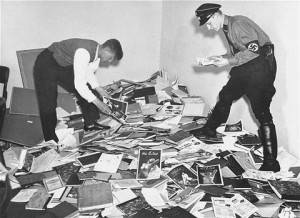 German students and Nazi SA plunder the library of Dr. Magnus Hirschfeld, Director of the Institute for Sexual Research in Berlin. The materials were loaded onto trucks and carted away for burning. © Unknown | United States Memorial Museum