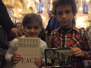 Arlo Varon and Lina Daloisio with gifts for the alter at the funeral of Dan Berrigan, 2016 © Jeremy Varon