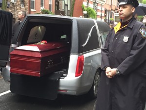 The body of Dan Berrigan leaving the funeral service, 2016 © Jeremy Varon