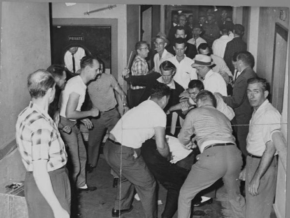 A group of people posing for a photo

Description automatically generated