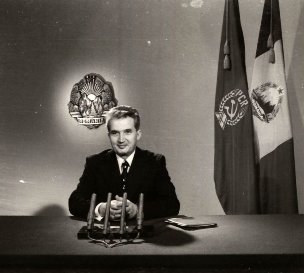 Romanian communist leader Nicolae Ceauşescu addressing his New Year's Eve message on tv and radio