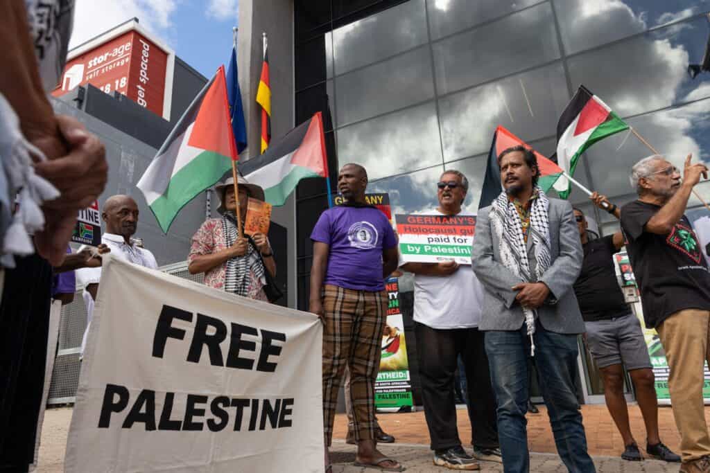 Photograph of people protesting outside the German consulate in Cape Town over the country’s position on the war in Gaza (February 9, 2024) | Ashraf Hendricks / GroundUp (CC BY-ND 4.0)