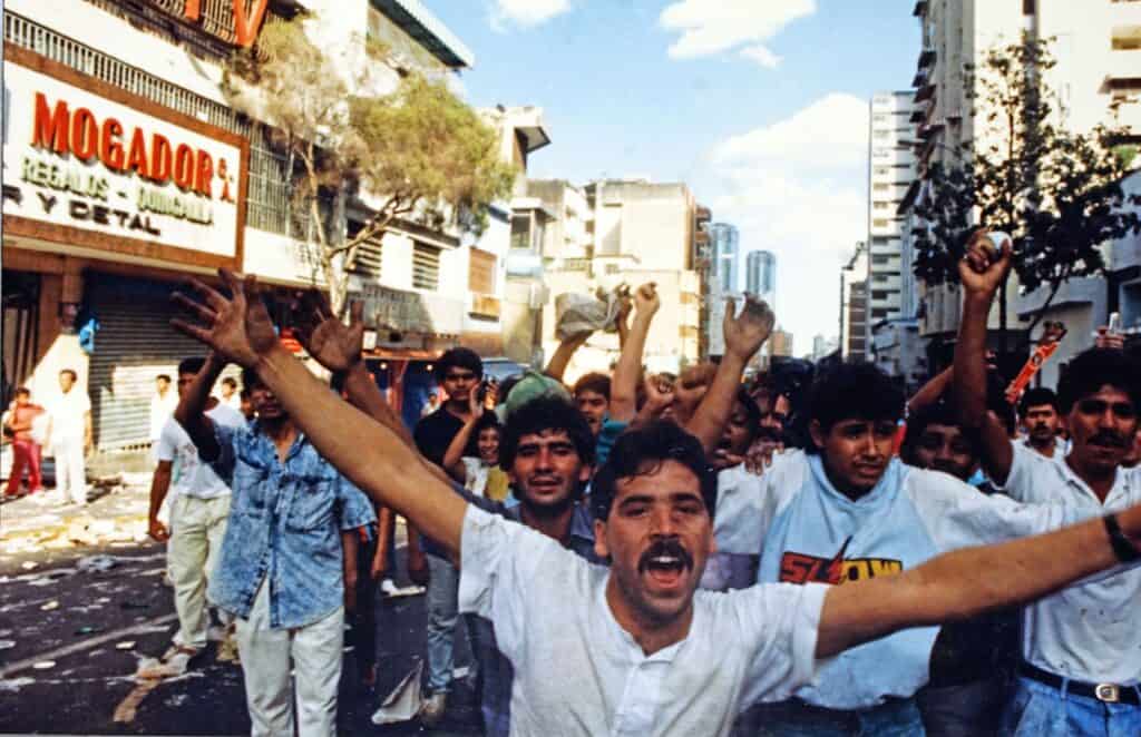 Crowd of protestors fill up a street