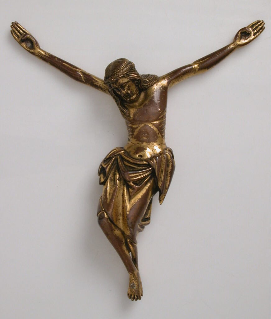Copper sculpture of crucified Christ