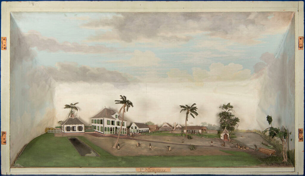 A diorama showing a sugar plantation in Suriname. Low buildings line the background, with one large house rising above the rest. A few scrubby trees and windswept palms dot the scene, and slaves can be seen working. The diorama’s background is a painted blue sky with puffy white-and-gray clouds.